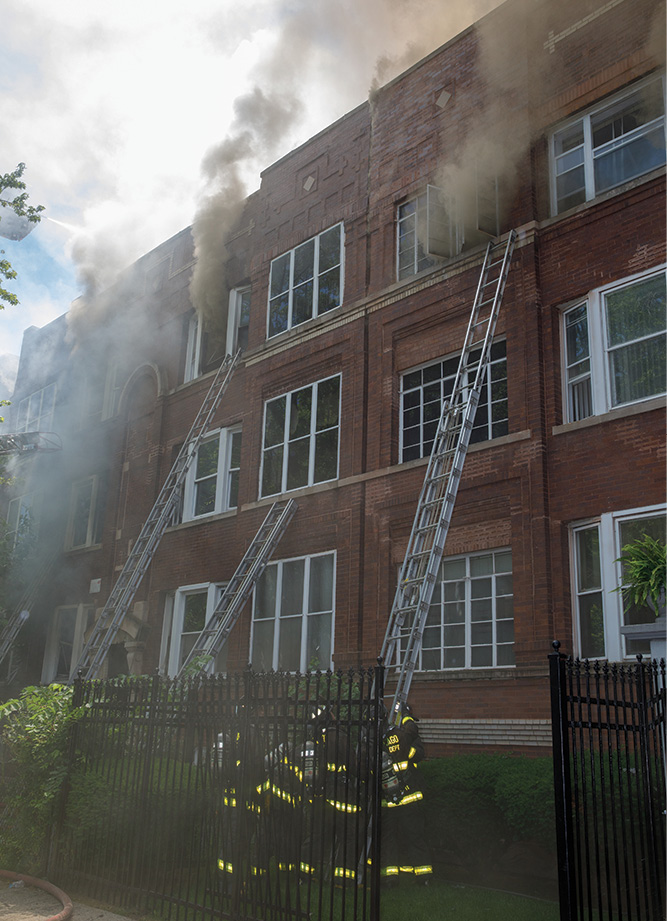 (3) As members raise a portable ladder to a window on the top floor of the exposure, we can see the smoke conditions in that window. Because of this, we need a truck company and an engine company on the top floor of both exposures.