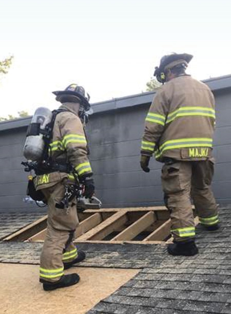 (6) Coordinating fire attack with vertical ventilation requires communication. Practice the communication aspect regularly. (Photo by author.)