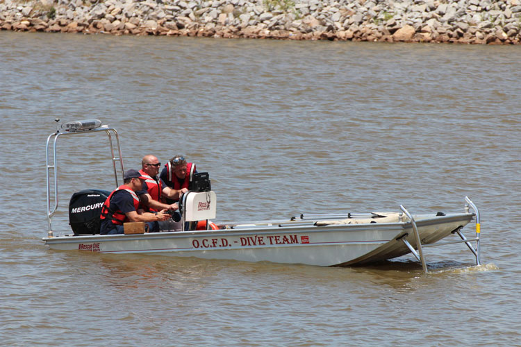 Dive team members on a boat