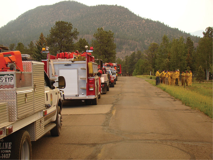 The resources on this incident may be able to address a wildland fire, but they are not prepared to fight a structure fire. (Photos by author.)