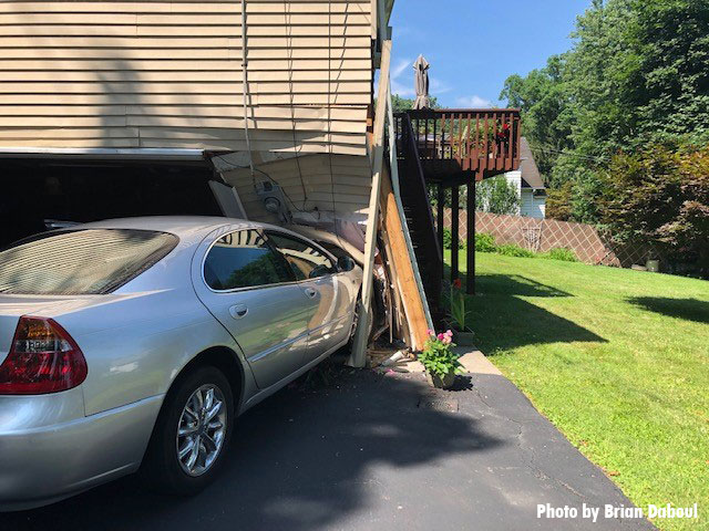 Car slammed into house