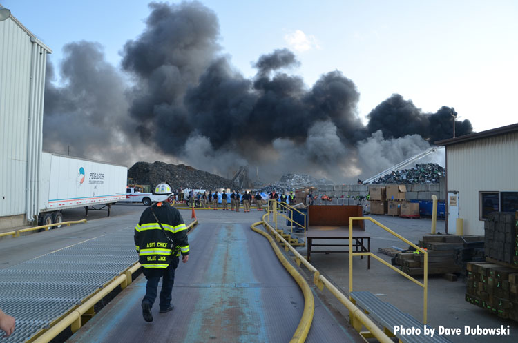 Firefighter at recycling plant fire