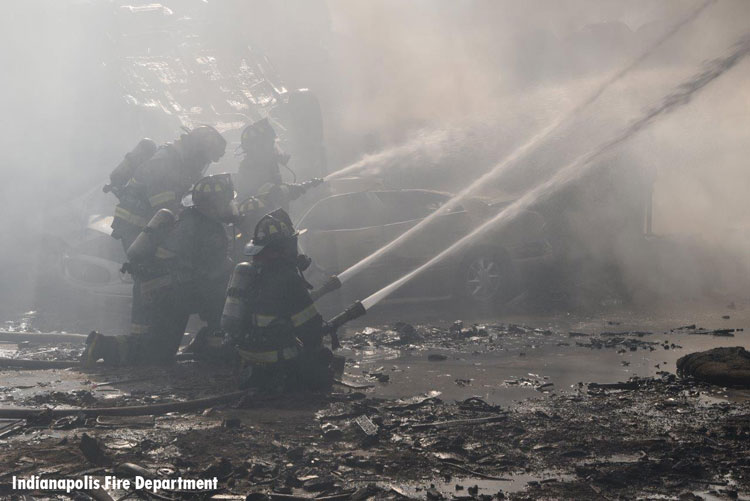 Firefighters at salvage yard fire