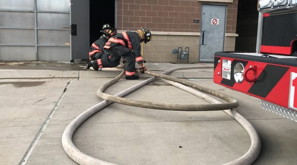 Intentional efforts to lay out hose properly will lead to crew efficiencies and decrease overall fatigue. The sections of hose that will move first during an advance should never be underneath portions that will remain static. (Photo by Shawn Duncan.)