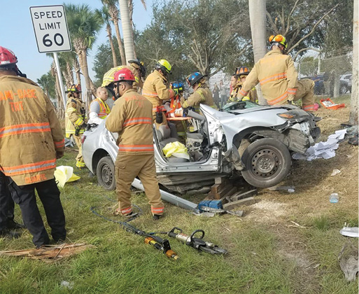 Rescuers package and remove the patient from the vehicle after the patient’s lower extremity was released from the wreckage, avoiding a field amputation.