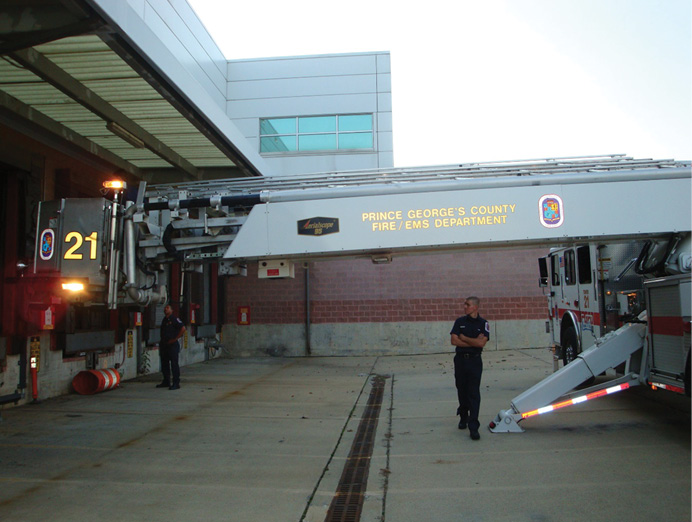 This photo shows the maximum amount of room that a tower ladder can occupy on the fireground without extending the device.