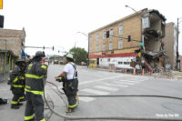 Chicago fire members assess the situation.