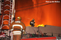 Firefighters working at the scene of a major fire in the city of Los Angeles.