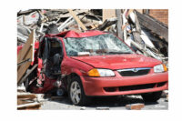 A vehicle in the debris.