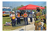 Firefighters at the command post during the incident.