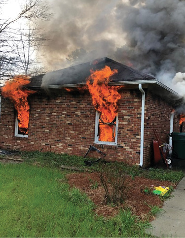 (2) A walk-around of the garage showed heavy fire from the rear windows on the C side.