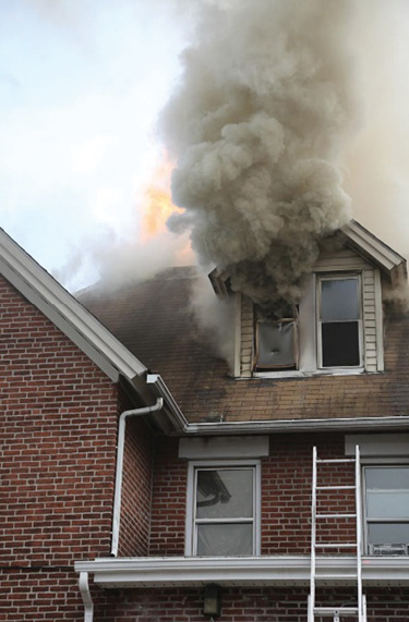 Dormer windows can provide substantial ventilation openings for finished attic spaces. (Photo by Patrick Dooley.)