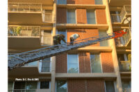 One person was rescued by a ladder from the apartment fire, and no injuries were reported.