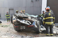 Indianapolis firefighters responded to a fatal incident in which a car fell from a parking garage.