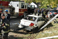 A wrecked vehicle with portable ladders