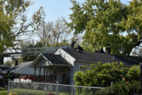 A view of Indianapolis firefighters accessing the roof.