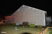 Melted siding on one home.