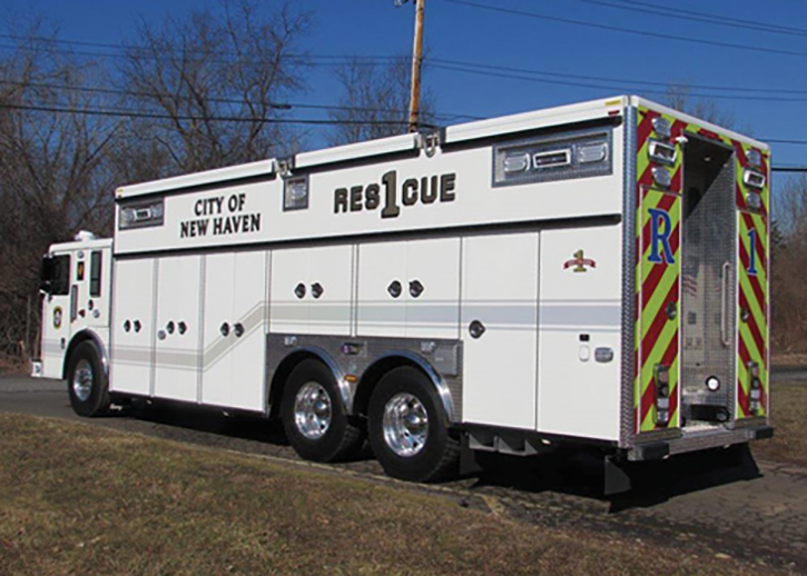 The New Haven (CT) Fire Department designed this heavy rescue truck built by RESCUE 1 MANUFACTURING with a two-seat cab and walk-in body with bench seat for the crew; this shortens the length of the vehicle, which provides better maneuverability through city streets and congestion.