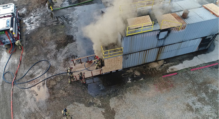 UAV pilot training above a live burn prop, Florin, California.