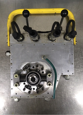 The internal workings of a vehicle hydraulic pump system. Four low-pressure pumps (1, 5, 7, and 11 o’clock at 5,000 psi). The pumps located at 3 and 9 o’clock are for high pressure that, when backpressure rises with increased resistance (or if the door won’t pop), it is sensed and boosts pressure to 10,000 psi.