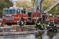 A fire truck and Indy firefighters on scene at the fire