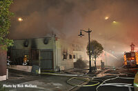 Smoke blankets the scene as City of Los Angeles crews responded to a fire in a vacant building.