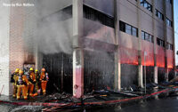 Smoke vents from the building.