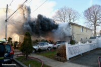 Smoke and fire at a house fire in the community of Lakeview.