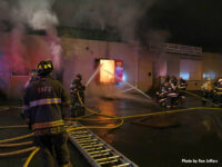 Firefighters at the scene of a fire in a commercial building in Lodi, New Jersey.