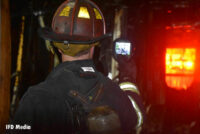 Firefighter with a TIC at the fire scene