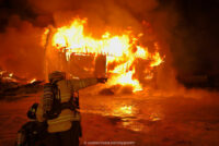 Firefighter at the scene of a major fire in Schodack, New York