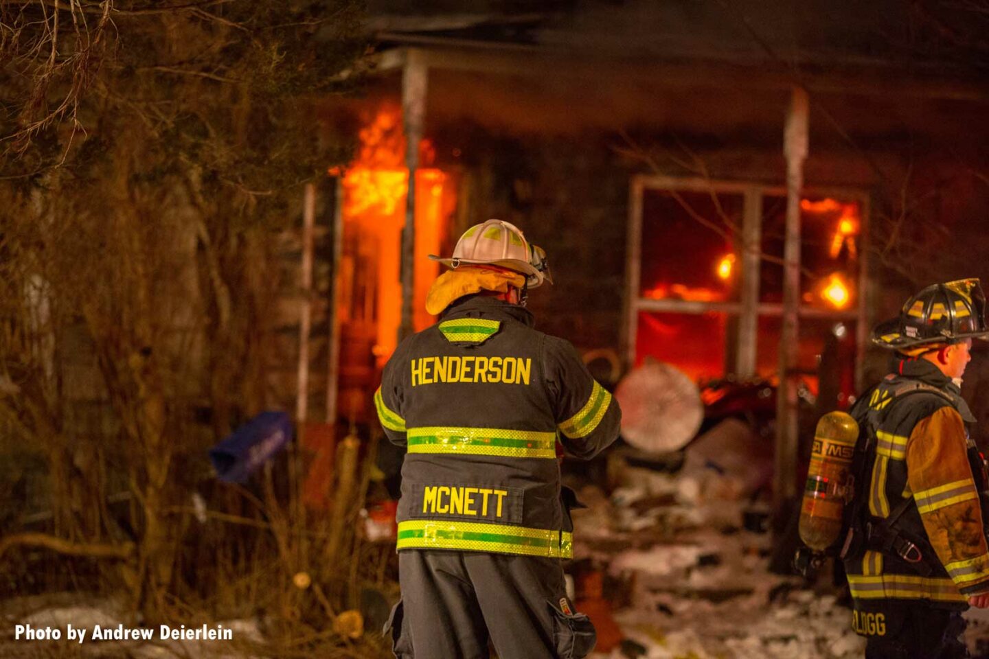 A view of firefighter and burning building