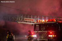 Aerial apparatus with ladder extended