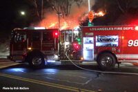 City of Los Angeles Fire Department rig pumping at brush fire