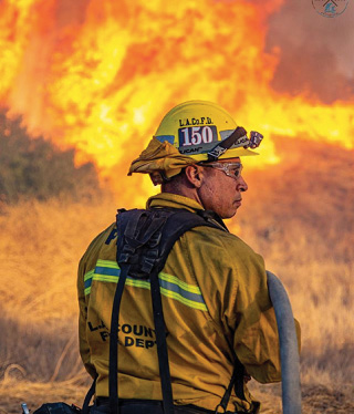 PELICAN PRODUCTS selected Daniel Biggs’ photograph of Los Angeles County (CA) Fire Department Firefighter Raul Perez as he fought the Tick Fire in Santa Clarita, California, in October 2019 as the company’s second winning image in its Portraits of Protection photo competition.