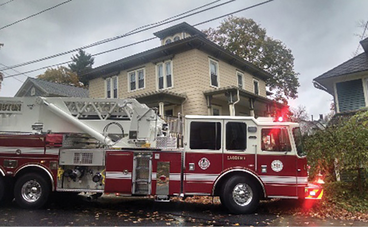 Firefighters in the Great Barrington (MA) Fire Department position their aerial tower under power lines to operate safely during this training exercise. (Photos courtesy of author.)