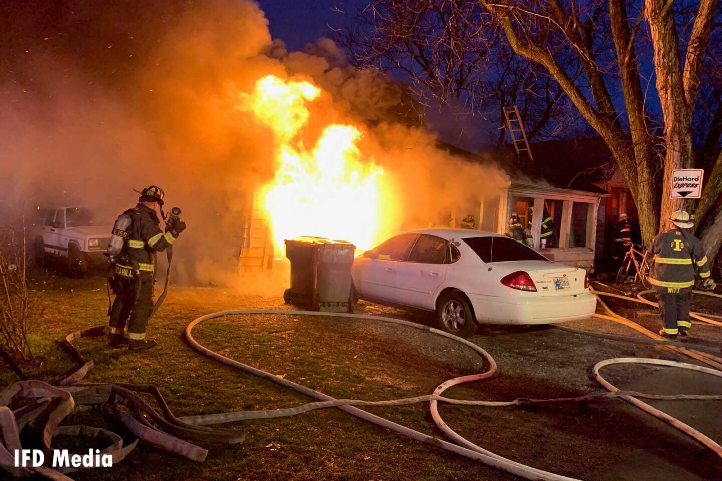 Indianapolis firefighters at scene of house fire