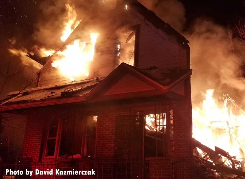 Flames shoot through a home in Buffalo New York