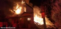 Flames burst from a home in Buffalo, New York.