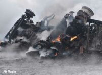 Flames in the burned wreckage of the tanker