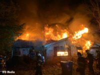 Indianapolis firefighters operate defensively at the house fire