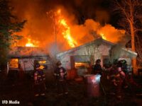 Indy fire crews work to control a residential fire