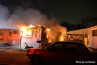 Flames shooting from a mobile home