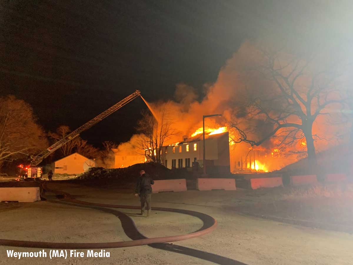 Fire apparatus and crews at a fire in Weymouth