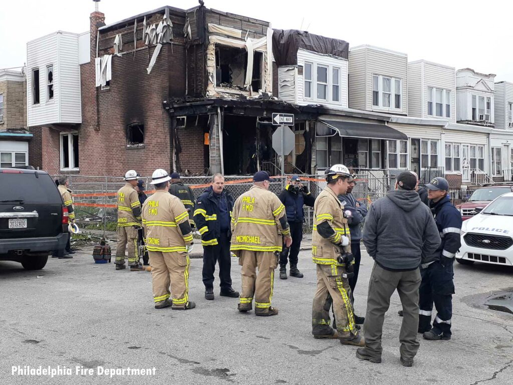 Philadelphia firefighters at the scene of a fatal fire