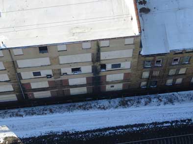 Birds-eye view of a building captured using a drone