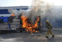 Flames shoot from a trailer in the Pacoima area of Los Angeles