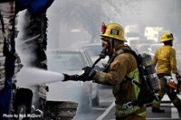 LAFD member with a hoseline