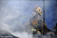 LAFD firefighter in full gear at trailer fire