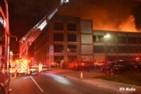 Aerial device trains stream on roof fire